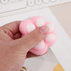 Zabawka antystresowa Gniotek Squishy Kocia różowa łapka z kulkami 7 cm
